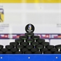 MALMO, SWEDEN - DECEMBER 28: Stacked warm-up pucks wait for the teams prior to preliminary round game USA vs. Slovakia at the 2014 IIHF World Junior Championship. (Photo by Francois Laplante/HHOF-IIHF Images)